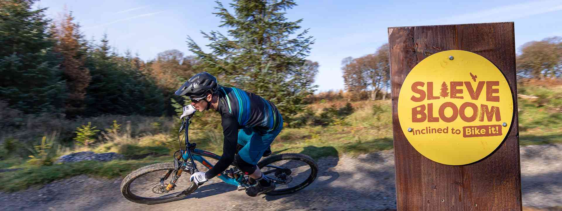 Person mountain biking