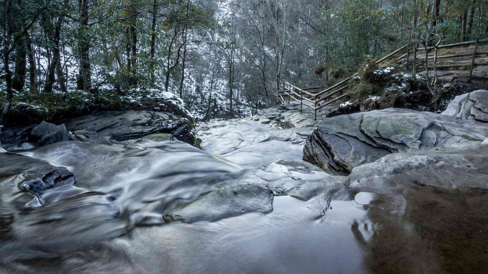 Waterfall in winter with snow